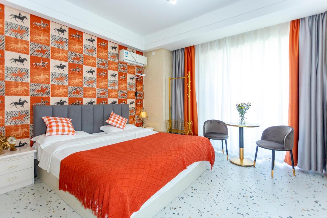Dalian Hong XI Yuan Apartment Wanda Plaza Экстерьер фото